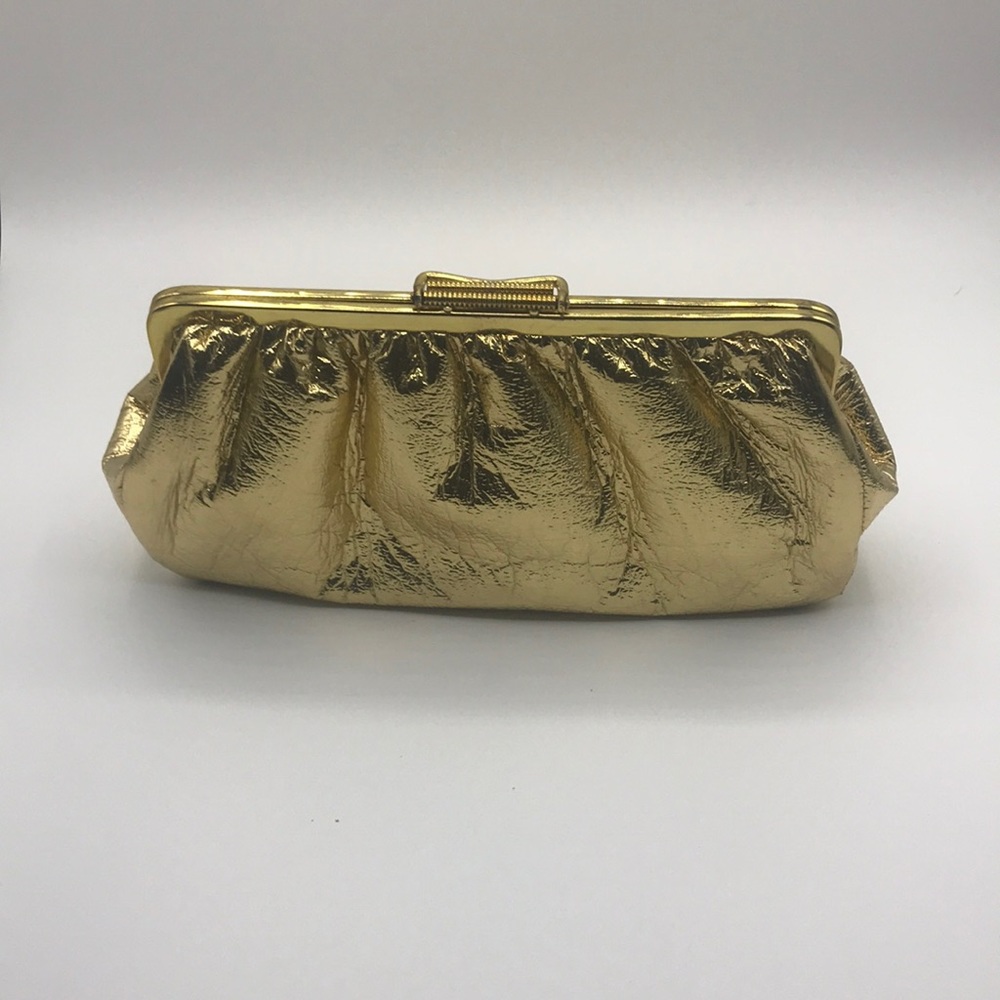 Vintage, Gold clutch purse. Snap latch closure.